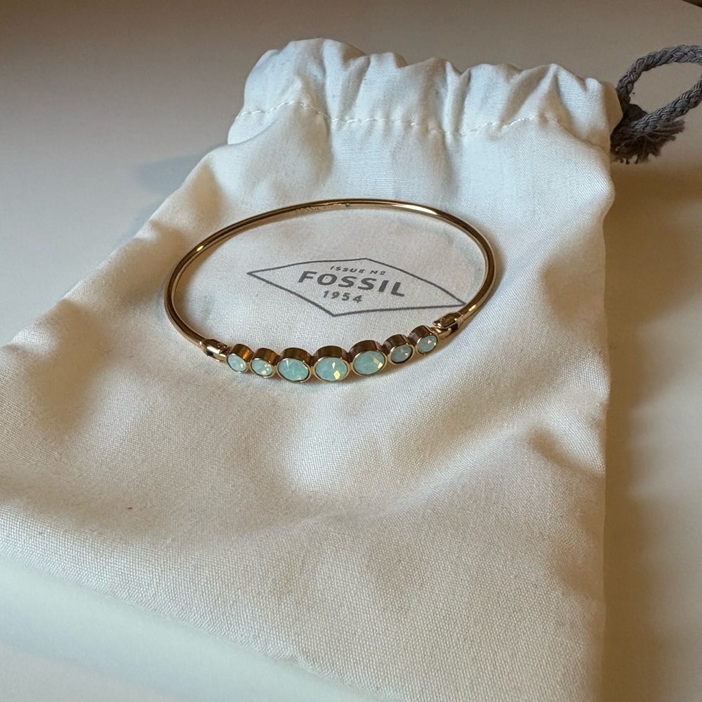Fossil Gold Bracelet with Blue Stones